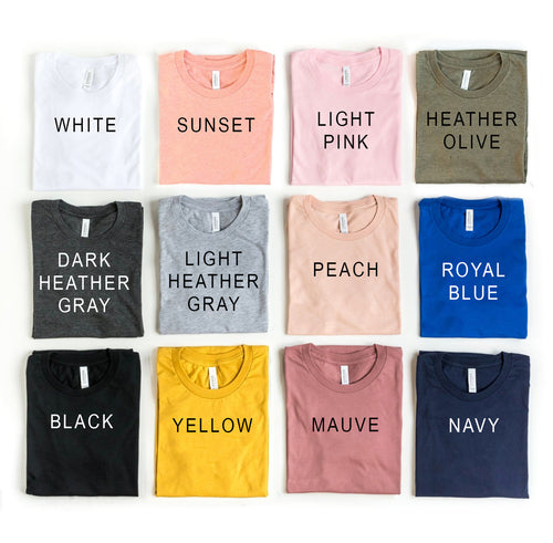A grid of twelve T-shirts in various colors